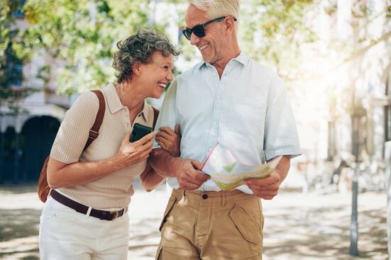 Retired Couple Walking Around Town