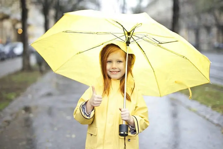 Little Girl Under Umbrella